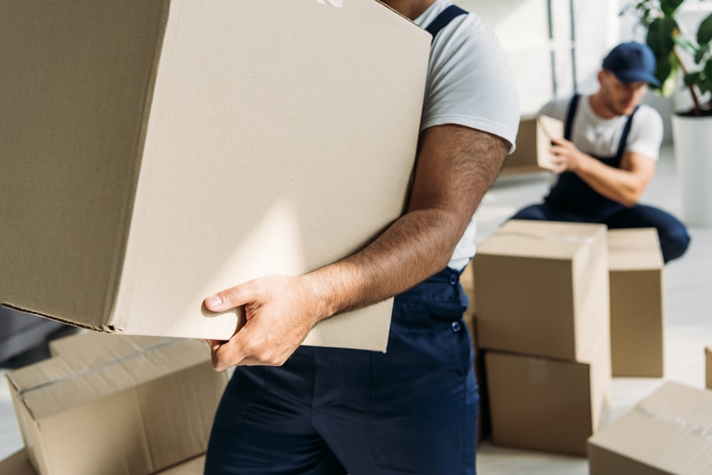 movers lifting boxes